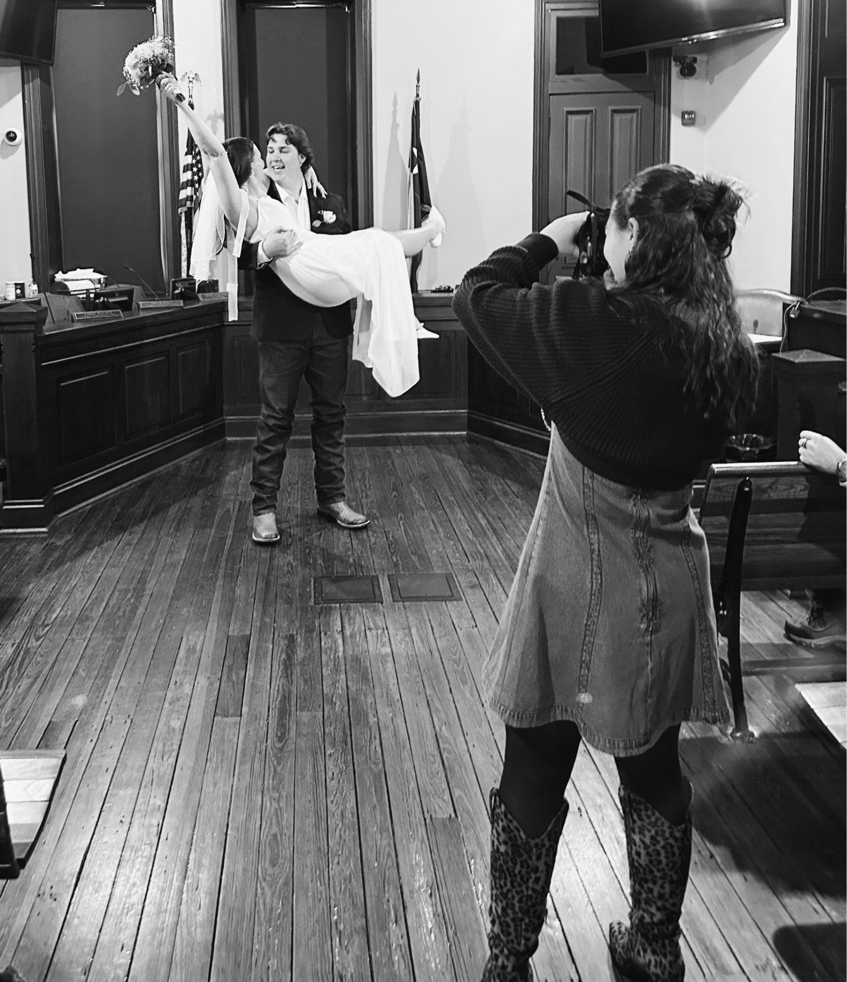 Niely photographing a couple at a courthouse wedding