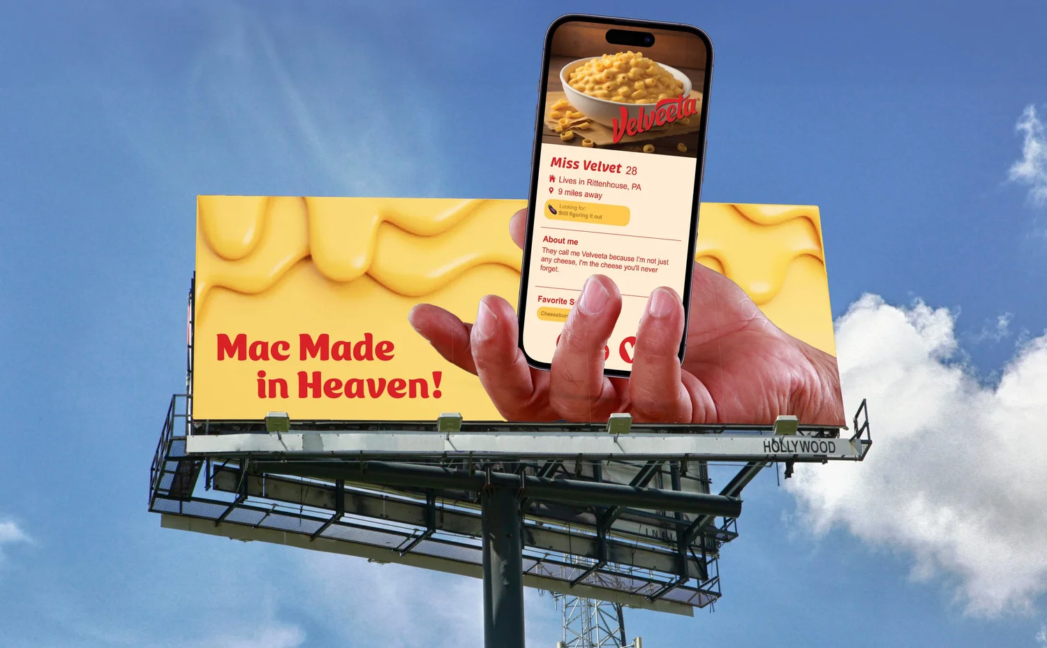 Velveeta ad campaign shown on a phone held in a hand